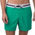 solid board shorts – green